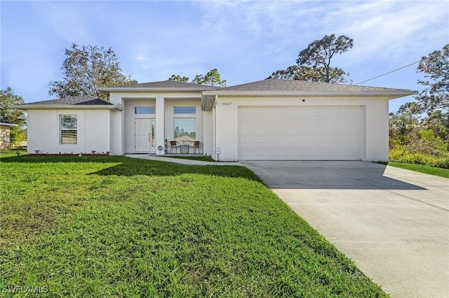 prairie-style home featuring a garage, a front lawn, concrete driveway, and stucco siding