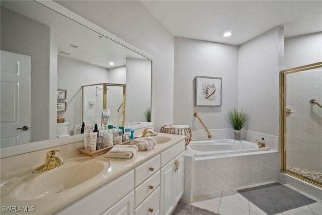 bathroom with tile patterned flooring, vanity, and plus walk in shower