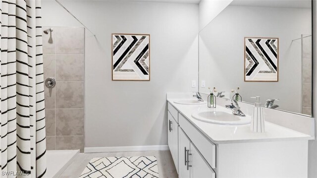 bathroom with vanity and a shower with curtain