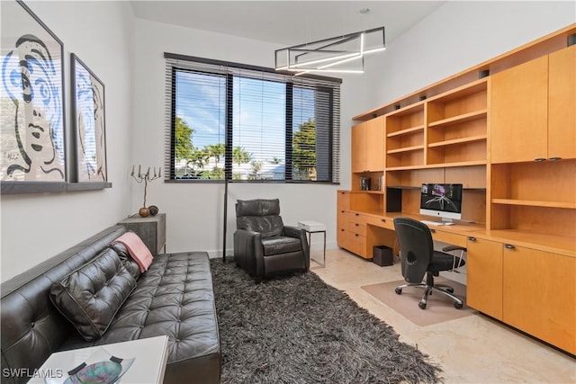 office area featuring built in desk