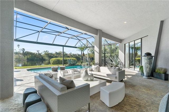 view of patio with an outdoor living space, a lanai, and a water view