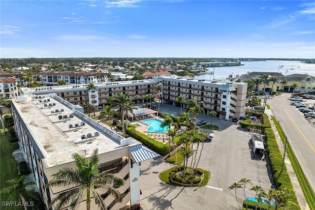 drone / aerial view with a water view