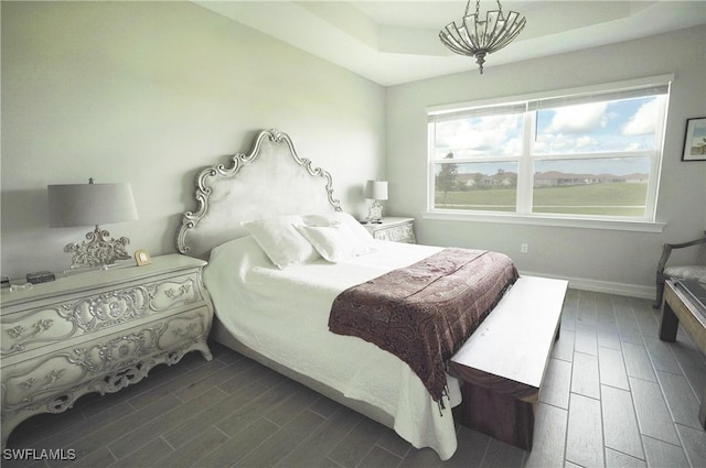 bedroom featuring a tray ceiling