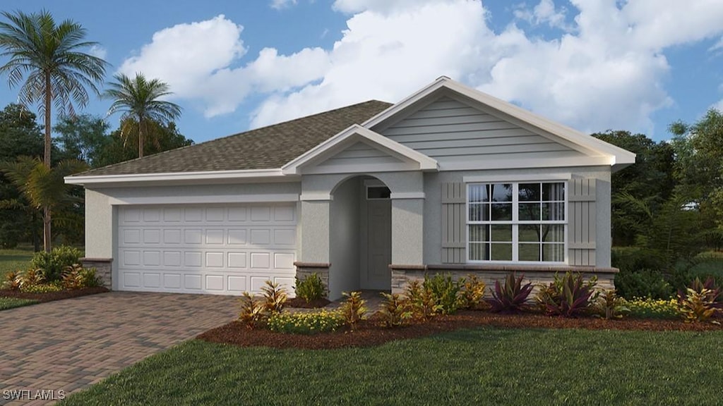 view of front of home featuring a garage and a front yard