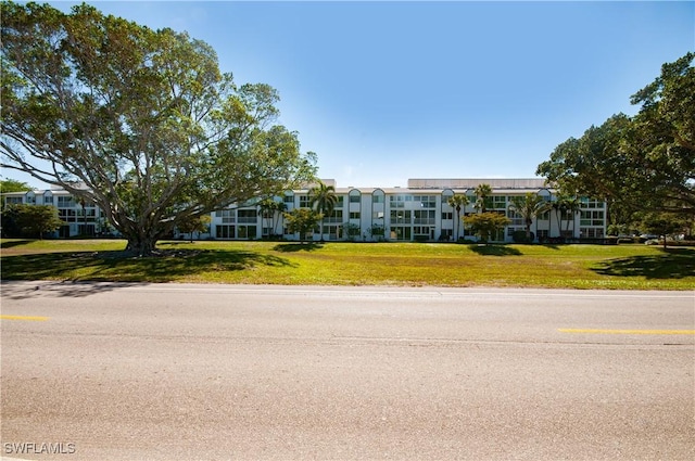 view of front of home with a front yard