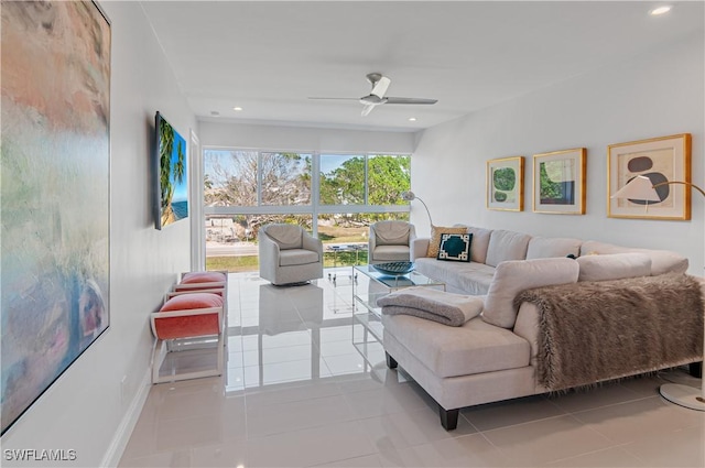 living room with light tile patterned floors and ceiling fan