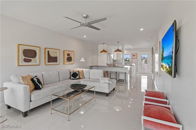 living room with ceiling fan