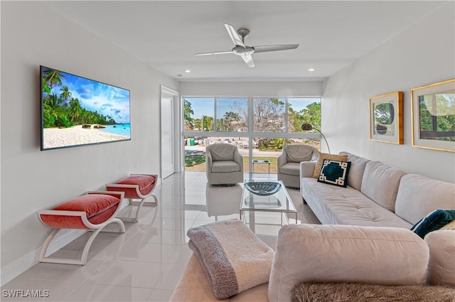 living room with ceiling fan and light tile patterned floors