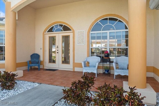 doorway to property with french doors