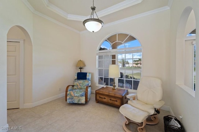 sitting room featuring light tile patterned floors, ornamental molding, and a raised ceiling