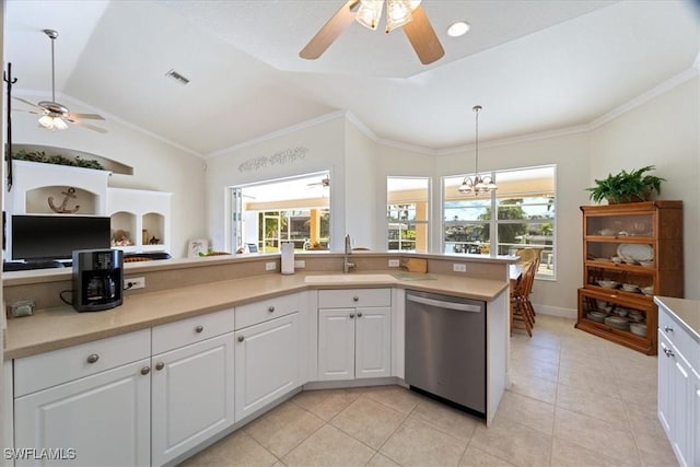 kitchen featuring white cabinetry, lofted ceiling, dishwasher, and sink