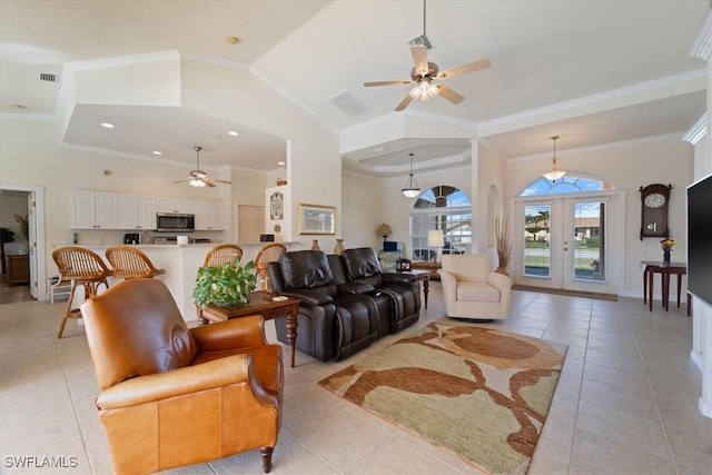 tiled living room featuring crown molding, high vaulted ceiling, french doors, and ceiling fan