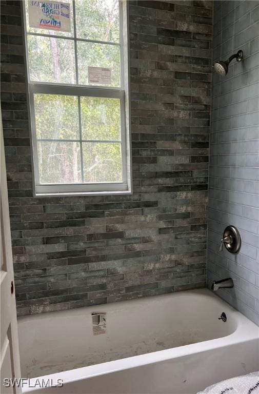 bathroom featuring bathing tub / shower combination