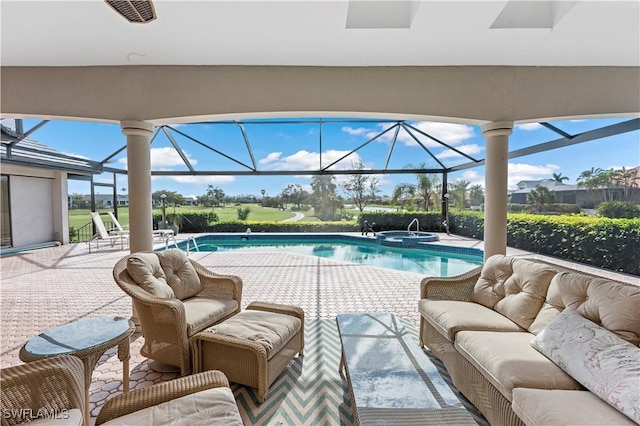 view of pool with an outdoor hangout area, an in ground hot tub, a patio, and glass enclosure