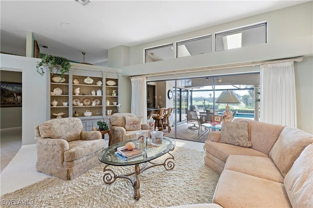 living room with light tile patterned floors