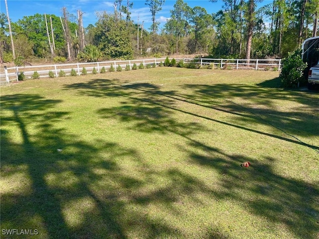 view of yard featuring fence