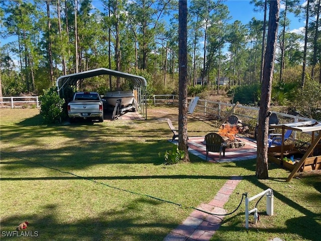 822 Johns Ave, Lehigh Acres, FL 33972 - view of yard with a carport