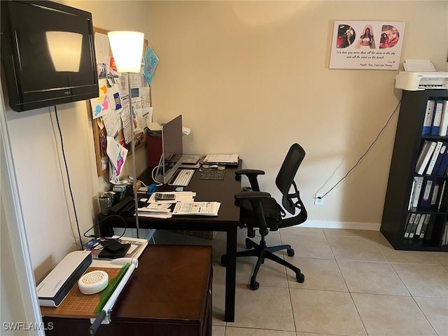 home office featuring light tile patterned flooring