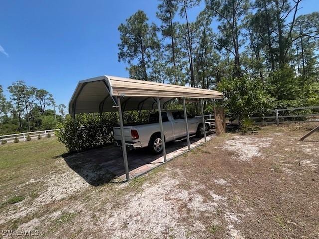 822 Johns Ave, Lehigh Acres, FL 33972 - view of car parking with a detached carport