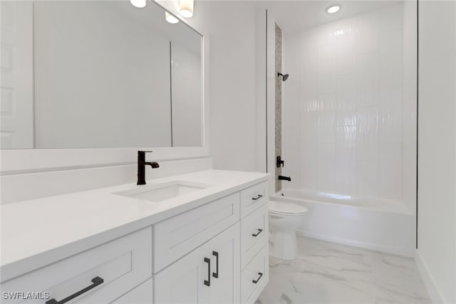 full bathroom featuring toilet, vanity, and tiled shower / bath