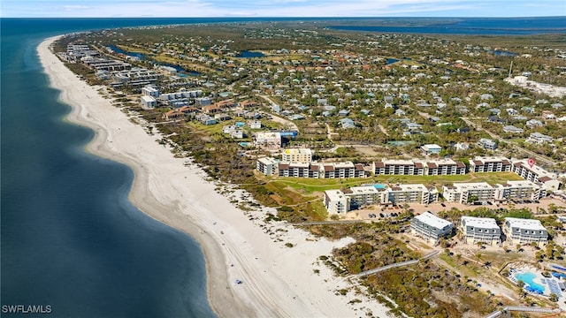 bird's eye view with a beach view and a water view