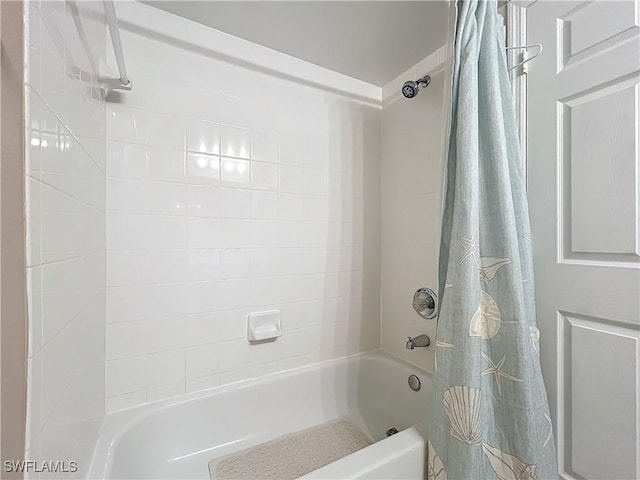 bathroom with shower / tub combo