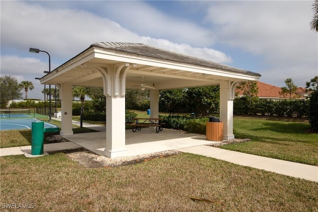 surrounding community featuring a gazebo, a yard, a patio, and tennis court