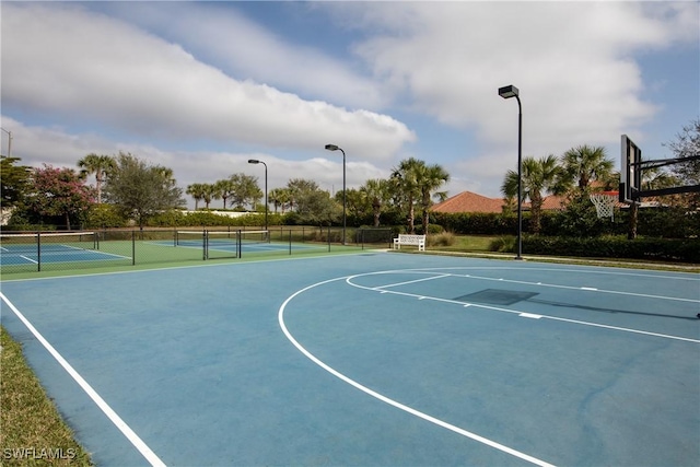 view of basketball court with tennis court