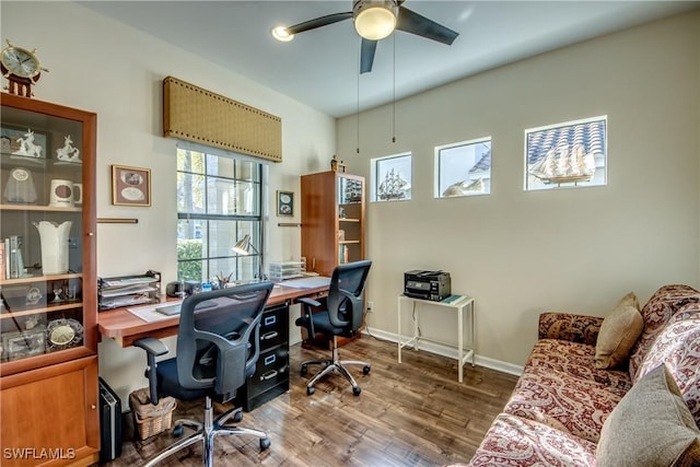 office with wood-type flooring and ceiling fan