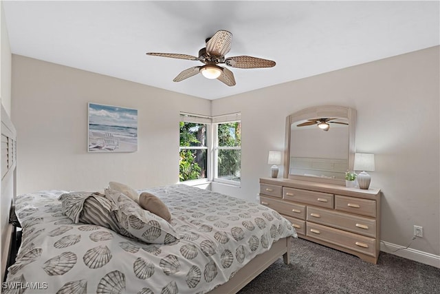 bedroom with dark carpet and ceiling fan