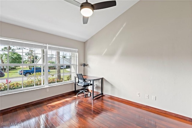 home office featuring wood-type flooring and ceiling fan