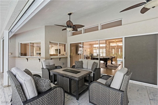 view of patio / terrace with an outdoor living space and ceiling fan