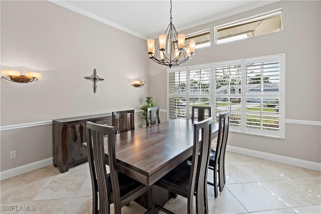 dining area featuring crown molding, an inviting chandelier, and light tile patterned floors