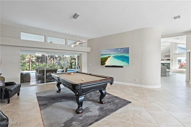 rec room with light tile patterned flooring, billiards, and lofted ceiling