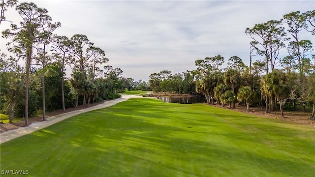 16648 Bobcat Ct, Fort Myers, FL 33908 - view of home's community with view of golf course and view of scattered trees