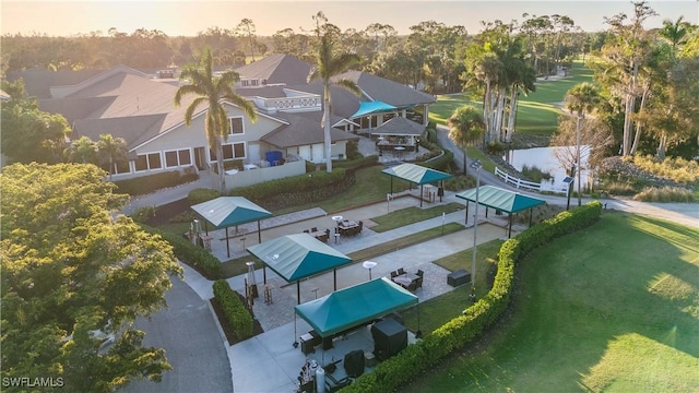 16648 Bobcat Ct, Fort Myers, FL 33908 - aerial view at dusk of view of wooded area and a residential view