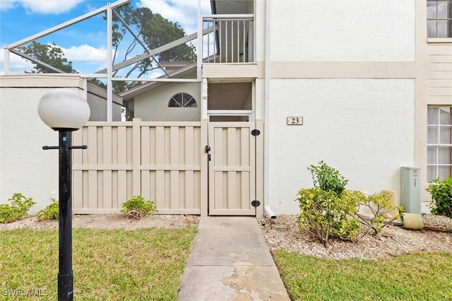 doorway to property with stucco siding