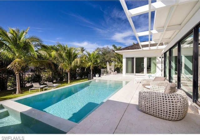 view of pool featuring a patio