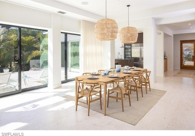 dining space with sink