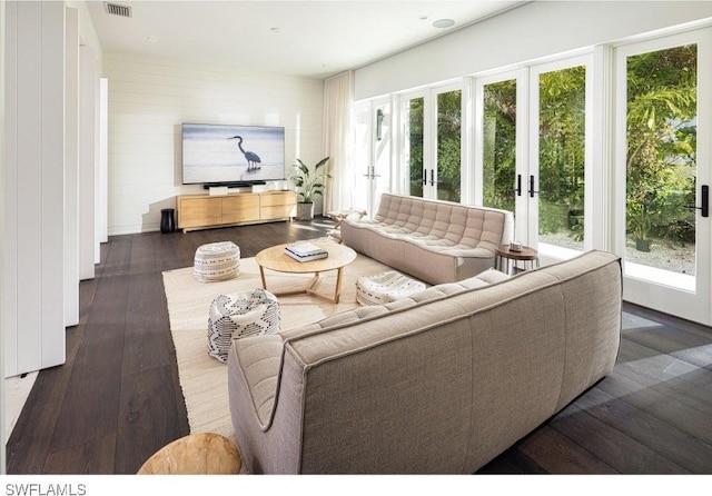 living room featuring dark hardwood / wood-style floors