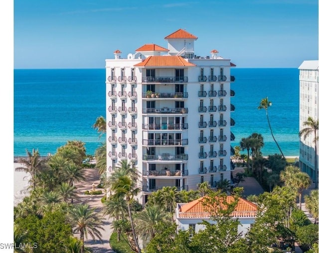 view of building exterior featuring a water view