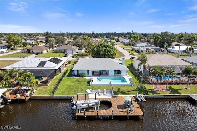 birds eye view of property featuring a water view