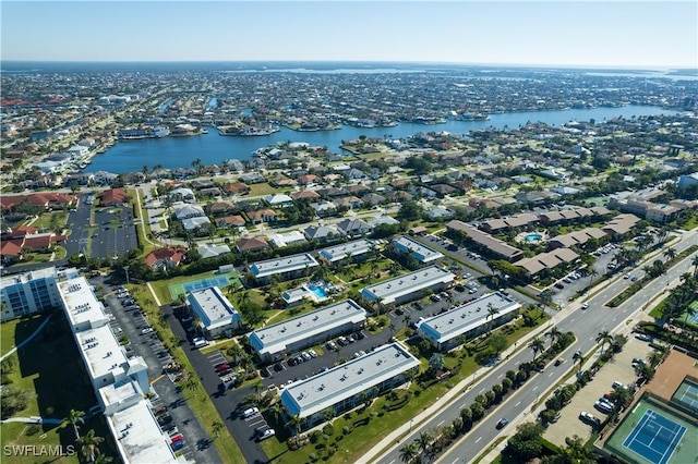 bird's eye view with a water view