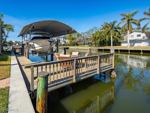 dock area featuring a water view