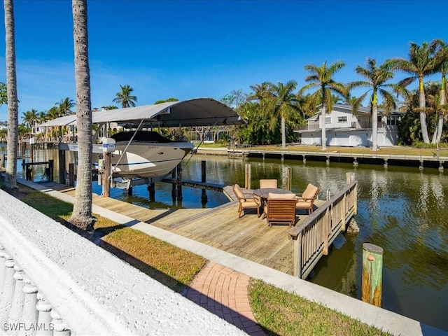 view of dock with a water view