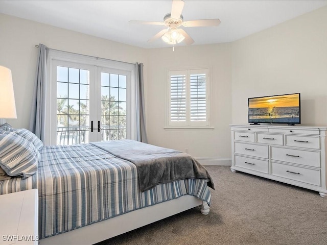 carpeted bedroom featuring french doors, ceiling fan, and access to exterior