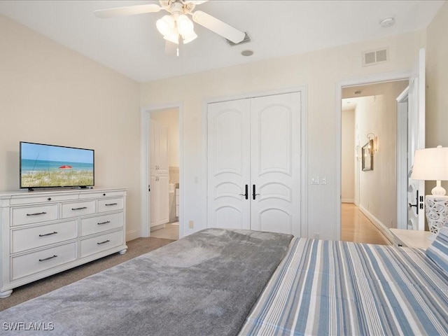 bedroom with a closet and ceiling fan