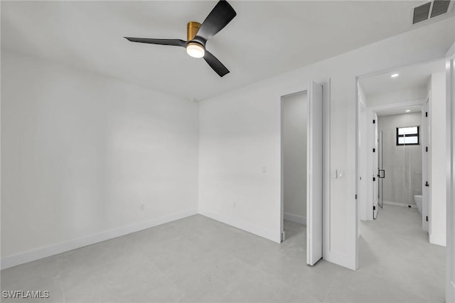 empty room featuring ceiling fan