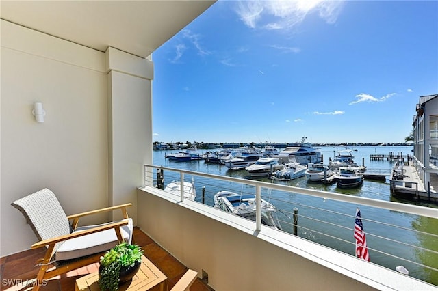 balcony featuring a water view