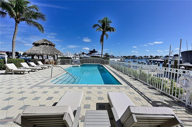 view of swimming pool featuring a gazebo and a patio area